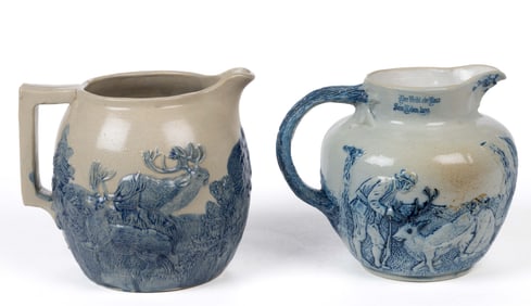 AMERICAN WHITE'S POTTERY, UTICA, NEW YORK MOLDED HUNTING MOTIF STONEWARE PITCHERS, LOT OF TWO