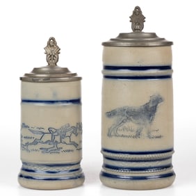 AMERICAN WHITE'S POTTERY, UTICA, NEW YORK DECORATED DOG MOTIF STONEWARE STEINS, LOT OF TWO