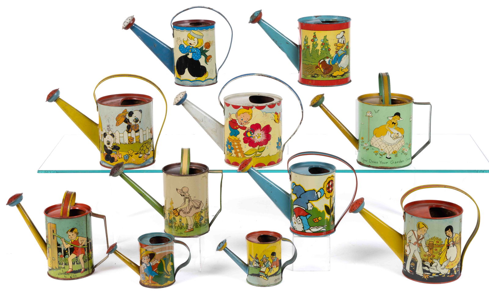 OHIO ART COMPANY TIN LITHOGRAPHED WATERING CANS, LOT OF 11 (1 of 2)