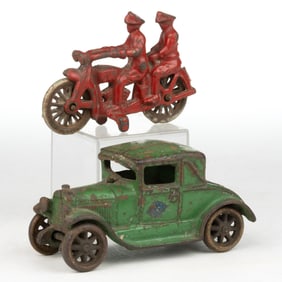 AMERICAN PAINTED CAST-IRON TOYS, LOT OF TWO