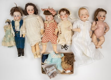 AMERICAN FULPER POTTERY CO. BISQUE-HEAD DOLLS, AND CLOTHING ARTICLES, UNCOUNTED LOT
