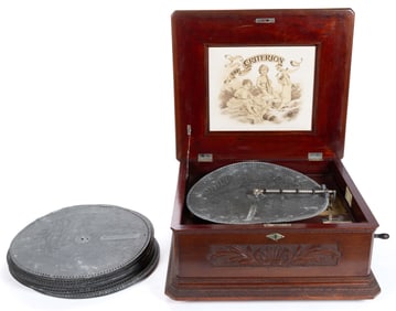 "THE CRITERION" MAHOGANY-CASED DISC-TYPE MUSIC BOX AND DISCS