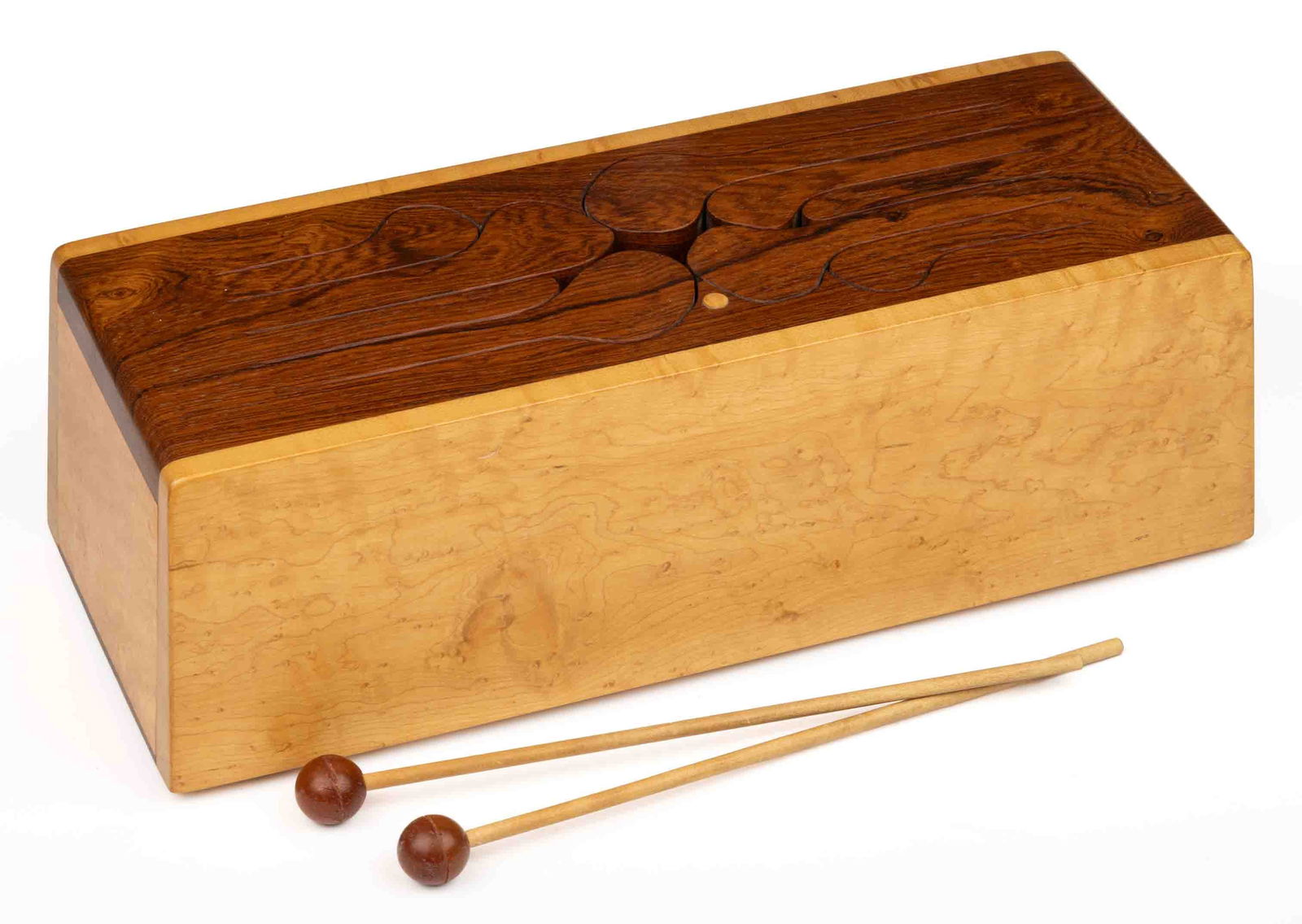 MICHAEL THIELE, HARDWOOD MUSIC COMPANY TONGUE DRUM: MICHAEL THIELE, HARDWOOD MUSIC COMPANY TONGUE DRUM, constructed of rosewood and figured maple, the idiophonic instrument features nine abstract-form keys cut into the top. The base is signed and dated