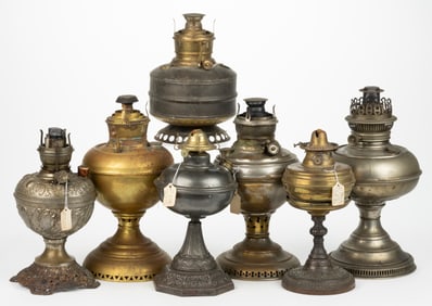ASSORTED BRASS AND SHEET-IRON KEROSENE STAND LAMPS, LOT OF SEVEN