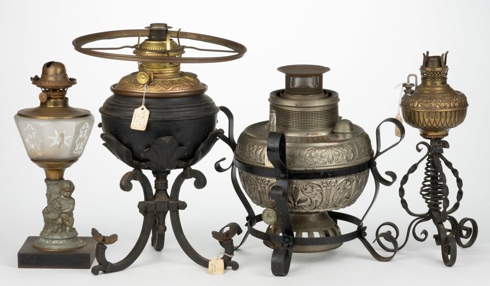 ASSORTED BRASS AND SHEET-IRON KEROSENE STAND LAMPS, LOT OF FOUR (1 of 1)