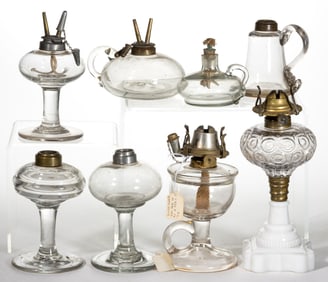 ASSORTED PATTERNED KEROSENE STAND AND FINGER LAMPS, LOT OF EIGHT