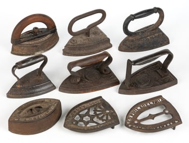 ASSORTED CAST-IRON SAD / FLAT IRONS AND TRIVETS, LOT OF NINE