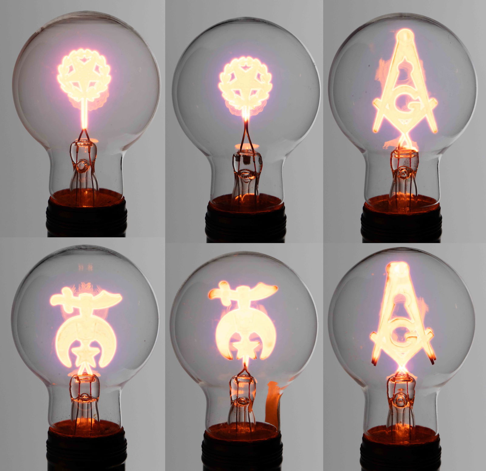 VINTAGE AEROLUX MASONIC / FRATERNAL ORDER FIGURAL FILAMENT GAS DISCHARGE / NEON GLOW LIGHT BULBS, (1 of 2)