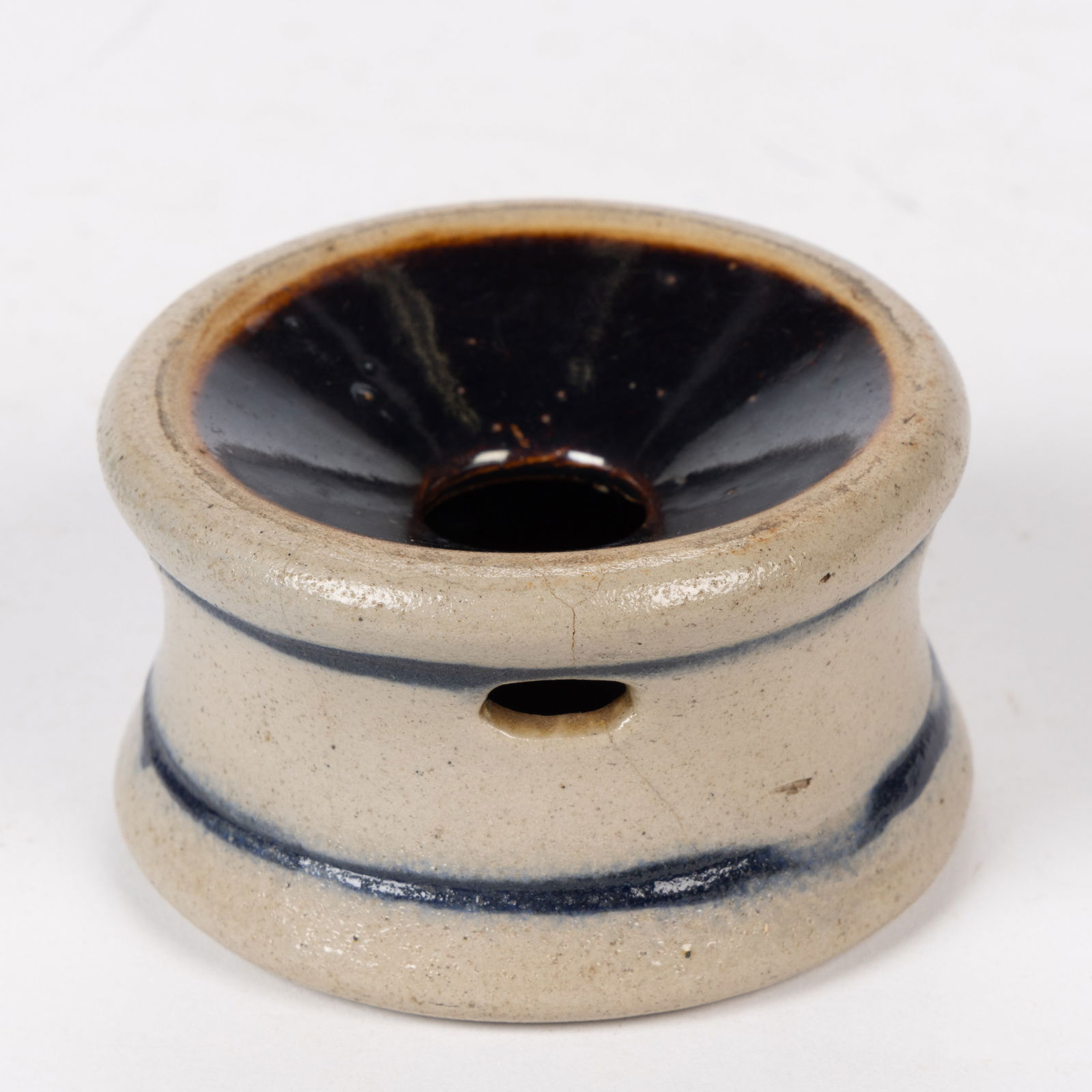 NEW YORK DECORATED STONEWARE MINIATURE CUSPIDOR / SPITTOON: NEW YORK DECORATED STONEWARE MINIATURE CUSPIDOR / SPITTOON, waisted cylindrical form with an ovoid drain hole, Albany-slip glaze to top. Brushed cobalt bands below rim and above foot. Fourth quar