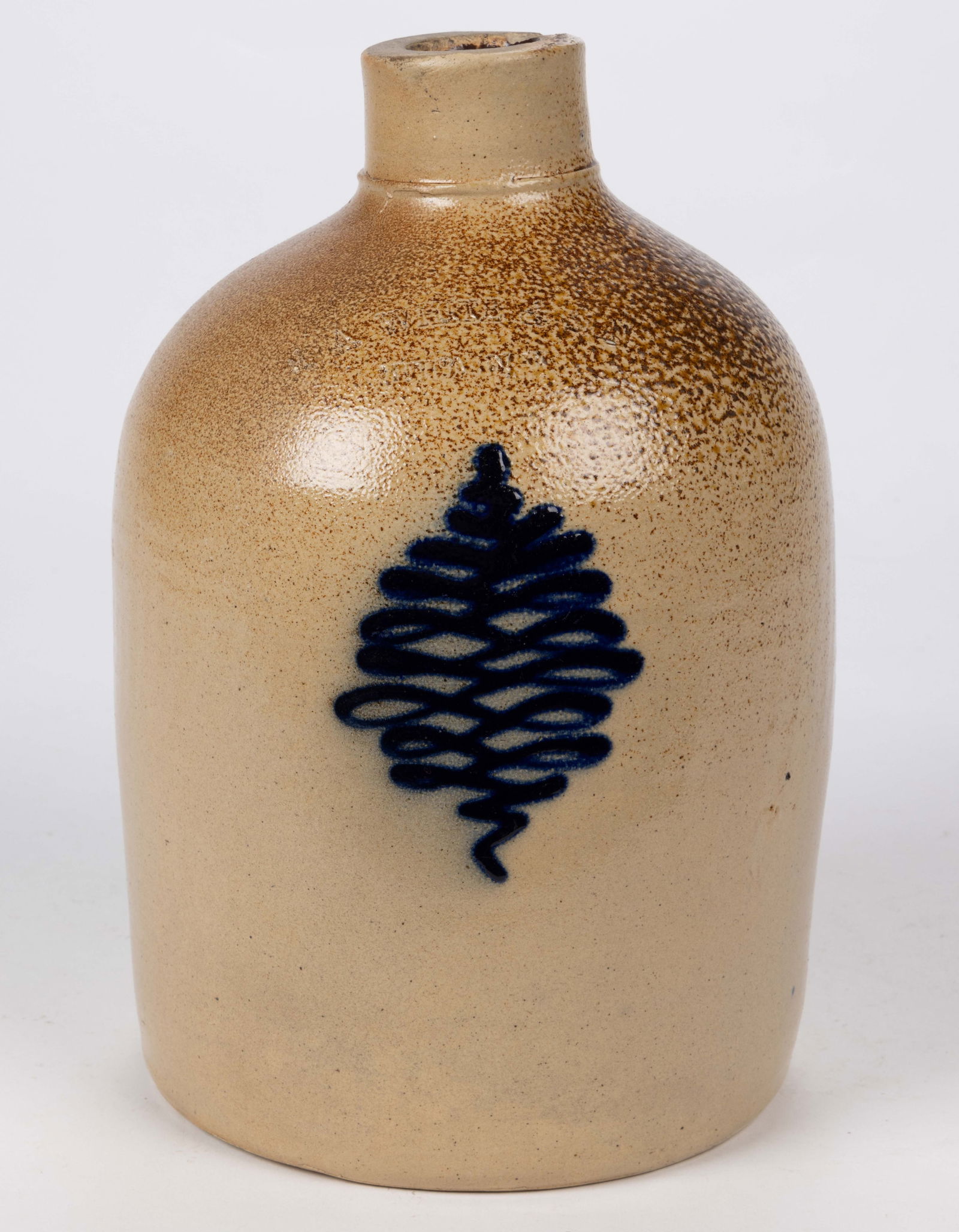 STAMPED "N. A. WHITE & SON / UTICA, N.Y.", NEW YORK DECORATED STONEWARE JUG: STAMPED "N. A. WHITE & SON / UTICA N.Y.", NEW YORK DECORATED STONEWARE JUG, salt-glazed, approximately one-gallon capacity, beehive form with ringed mouth and strap handle with