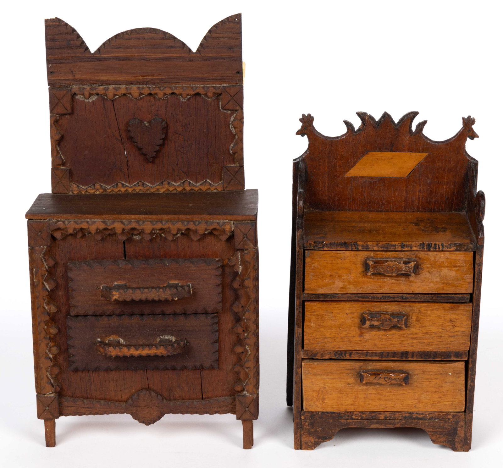 AMERICAN FOLK / TRAMP ART MINIATURE CHESTS OF DRAWERS / DRESSERS, LOT OF TWO: AMERICAN FOLK / TRAMP ART MINIATURE CHESTS OF DRAWERS / DRESSERS, LOT OF TWO, each of similar form with a shaped backsplash over a rectangular top, the larger having chip-carved and notch-ca