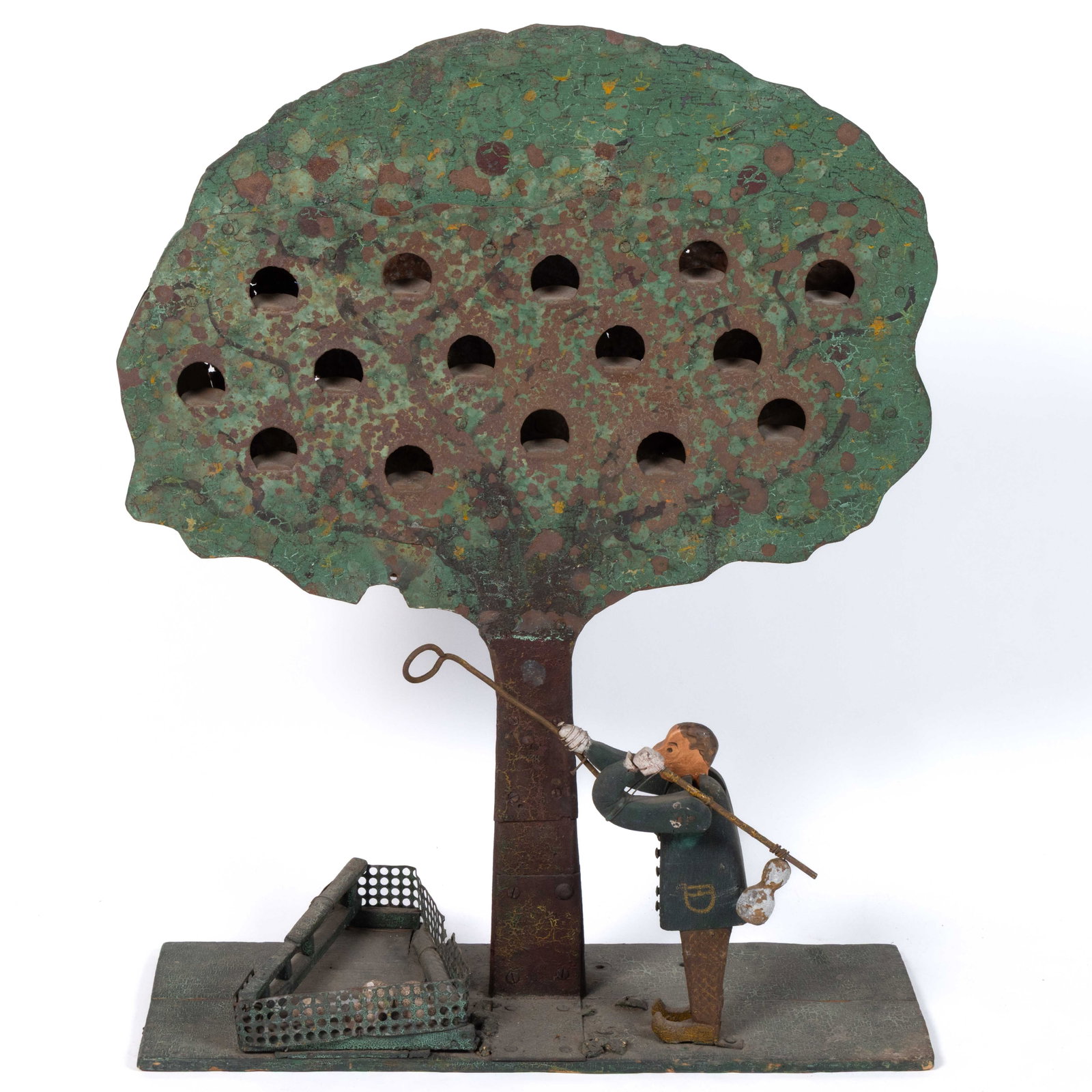 AMERICAN FOLK ART FIGURAL PAINTED CARNIVAL SHOOTING GALLERY TARGET: AMERICAN FOLK ART FIGURAL PAINTED CARNIVAL SHOOTING GALLERY TARGET, a whimsical vernacular example in the form of an apple tree with apple picker below, retaining possibly original painted surface. Di