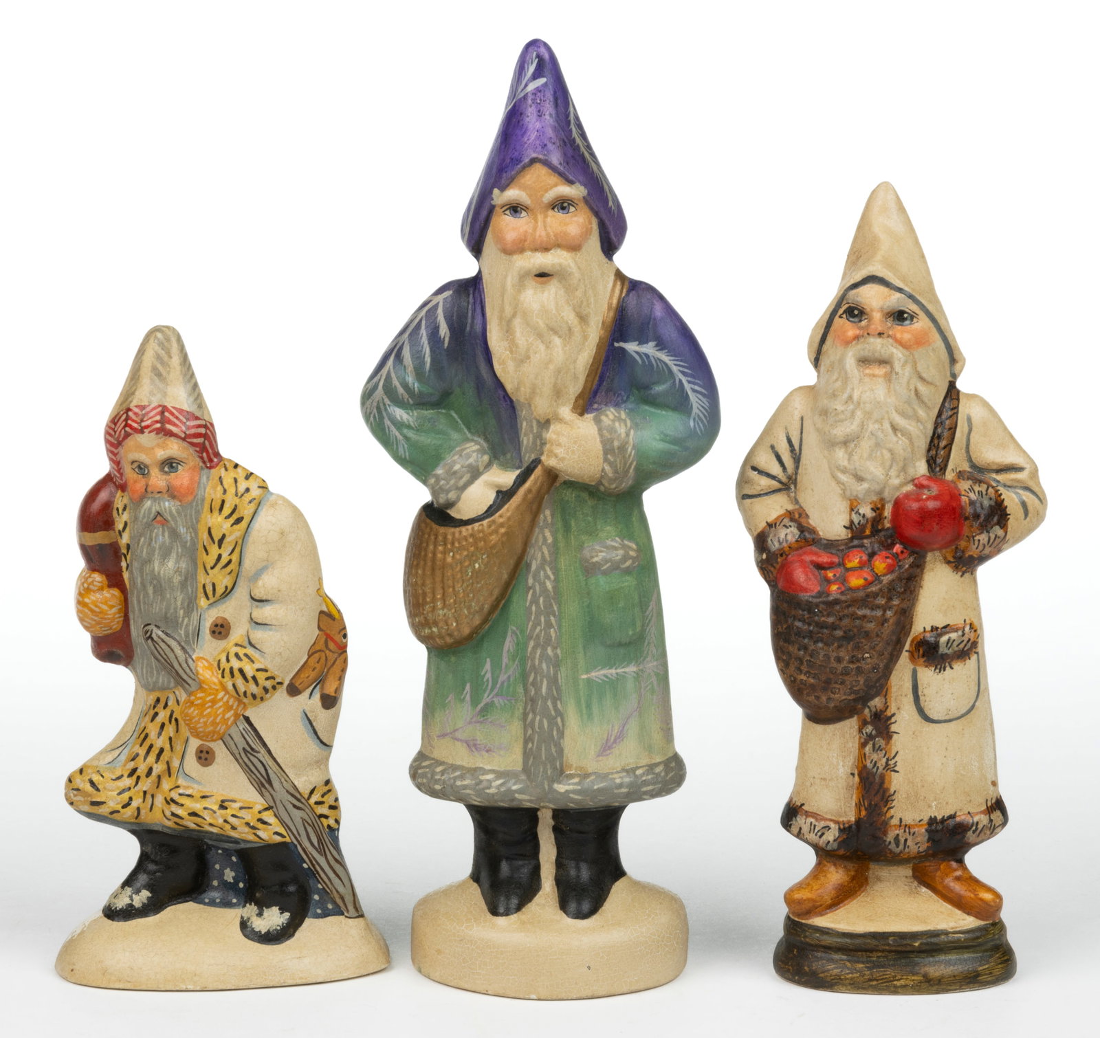 ASSORTED VAILLANCOURT FOLK ART PAINT-DECORATED CHALKWARE FIGURAL FATHER CHRISTMAS FIGURES, LOT OF: ASSORTED VAILLANCOURT FOLK ART PAINT-DECORATED CHALKWARE FIGURAL FATHER CHRISTMAS FIGURES, LOT OF THREE, each signed to the underside of the base "Vaillancourt Folk Art / Sutton, Masstts.", 