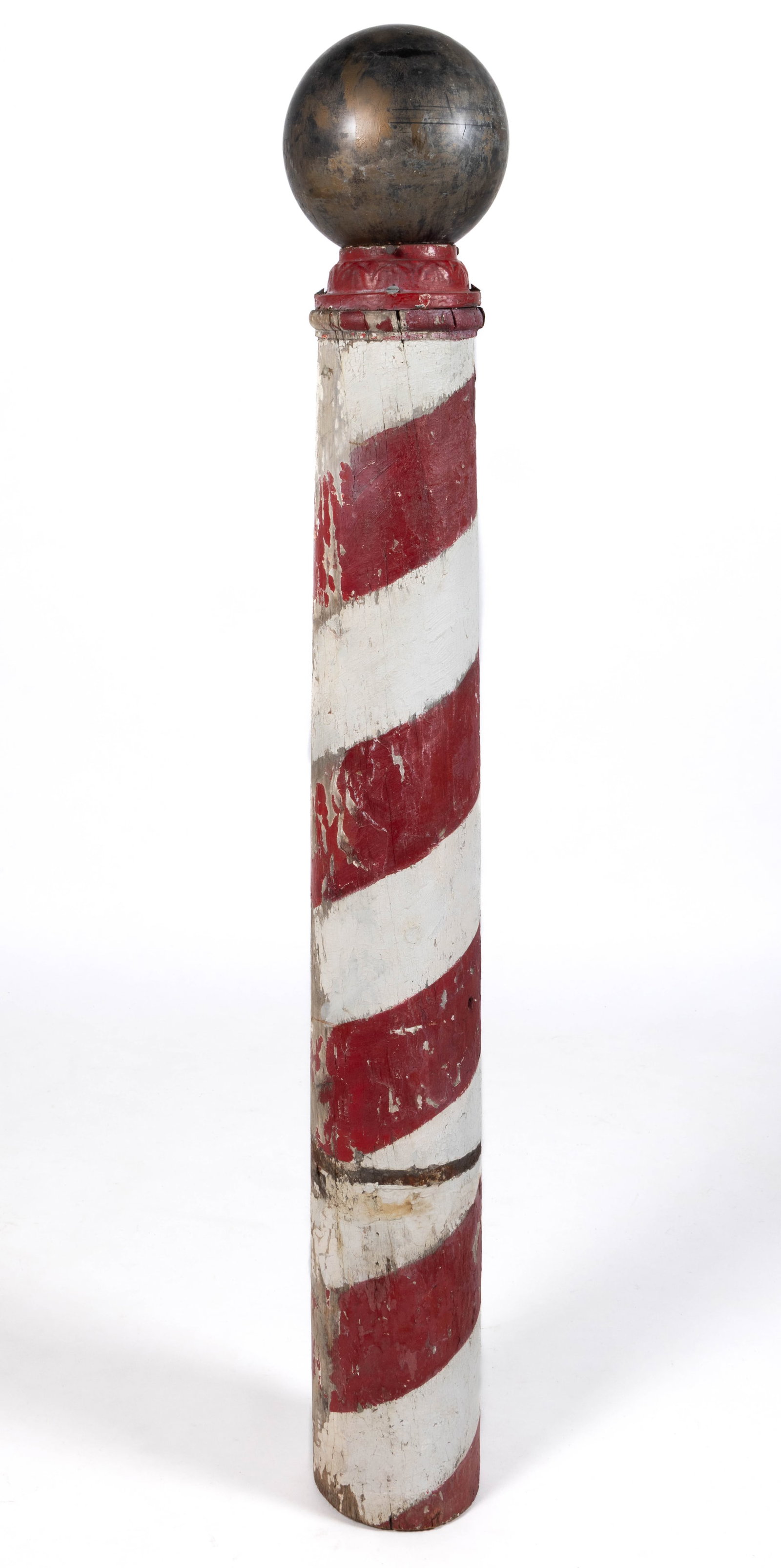 AMERICAN FOLK ART PAINTED WOODEN BARBER POLE: AMERICAN FOLK ART PAINTED WOODEN BARBER POLE, retaining an old red-and-white surface with gold-like finial. Late 19th/first quarter 20th century. 62" HOA. Provenance: From a Northern Virginia col