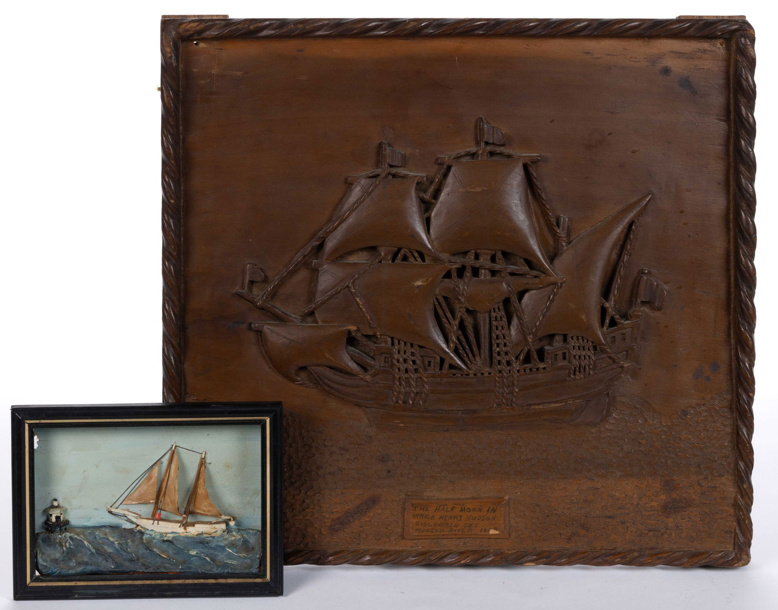 AMERICAN FOLK ART NAUTICAL CARVINGS, LOT OF TWO: AMERICAN FOLK ART NAUTICAL CARVINGS, LOT OF TWO, comprising a small ship diorama marked "Chesapeak [sic] Bay Bugeye approaching Thomas Light" and a relief-carved plaque depict