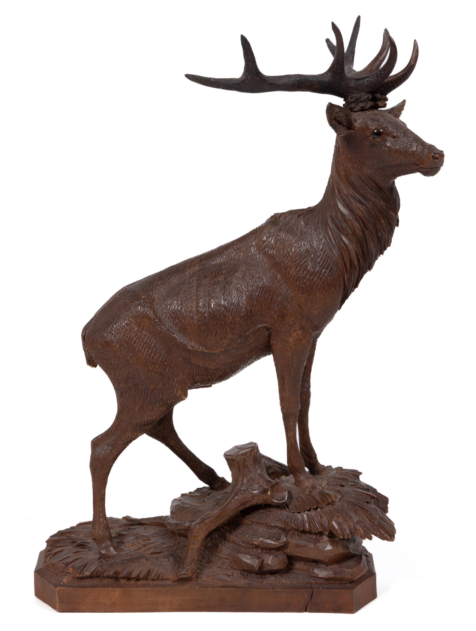 GERMAN / SWISS BLACK FOREST CARVED WALNUT FIGURE OF AN ELK: GERMAN / SWISS BLACK FOREST CARVED WALNUT FIGURE OF AN ELK, finely delineated example with glass eyes, retaining possibly original surface. Late 19th/early 20th century. 14 1/2" HOA. Provenance: 