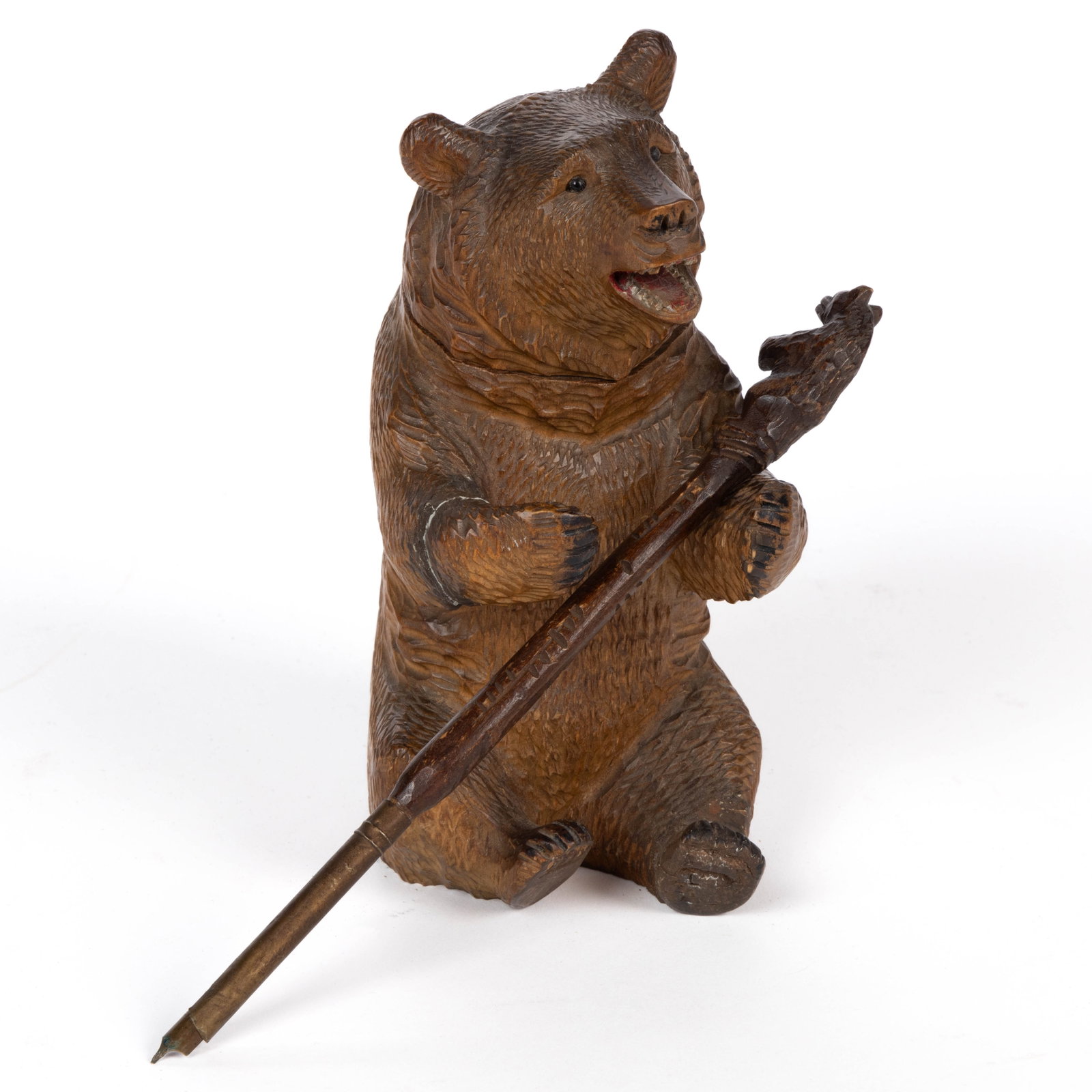 GERMAN / SWISS BLACK FOREST CARVED BEAR INK STAND / INKWELL AND PEN, LOT OF TWO: GERMAN / SWISS BLACK FOREST CARVED BEAR INK STAND / INKWELL AND PEN, LOT OF TWO, finely carved form of a bear sitting upright with its mouth open and legs facing outward, the hinged head tilts ba