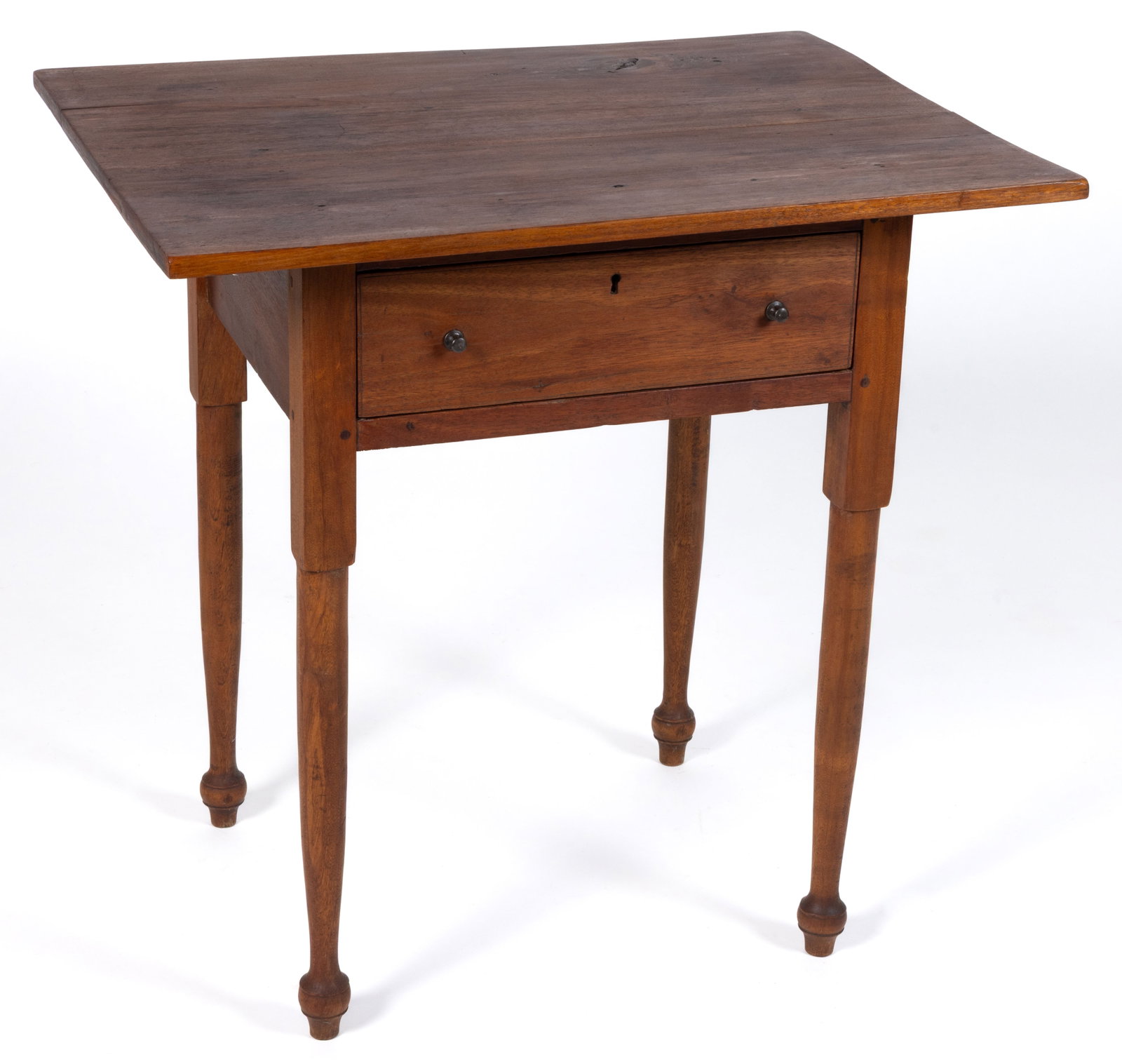 EAST TENNESSEE OR SOUTHWEST VIRGINIA LATE FEDERAL WALNUT AND CHERRY STAND TABLE: EAST TENNESSEE OR SOUTHWEST VIRGINIA LATE FEDERAL WALNUT AND CHERRY STAND TABLE, with two-board overhanging top, single full drawer, and tall turned legs. Walnut secondary wood. Retaining an old surfa