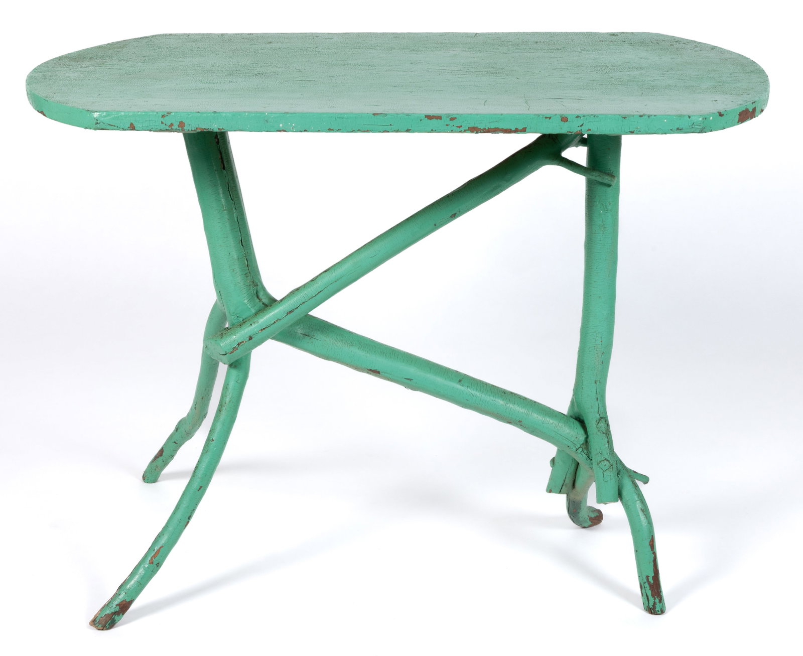 AMERICAN RUSTIC PAINTED TWIG TABLE: AMERICAN RUSTIC PAINTED TWIG TABLE, the oval one-board top raised on a stylized naturalistic base, the whole retaining an old green-painted surface. Late 19th/first quarter 20th century. 31 1/2" 