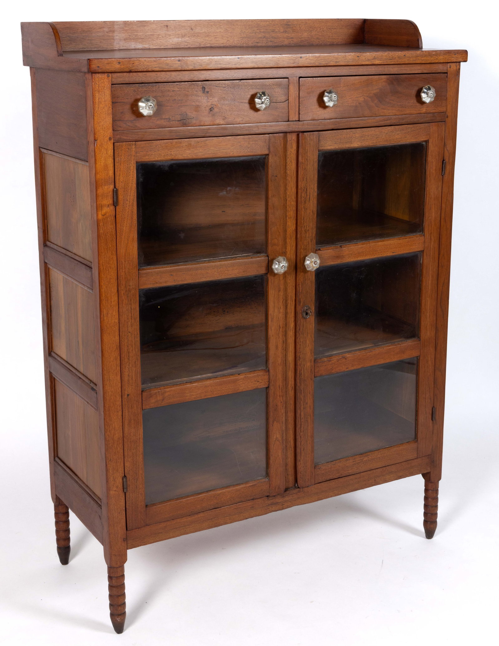 AMERICAN WALNUT PIE SAFE / JELLY CUPBOARD: AMERICAN WALNUT PIE SAFE / JELLY CUPBOARD, the rectangular top with an applied gallery and plain edge molding over two short drawers, and two hinged cabinet doors each with three glazed panels wh