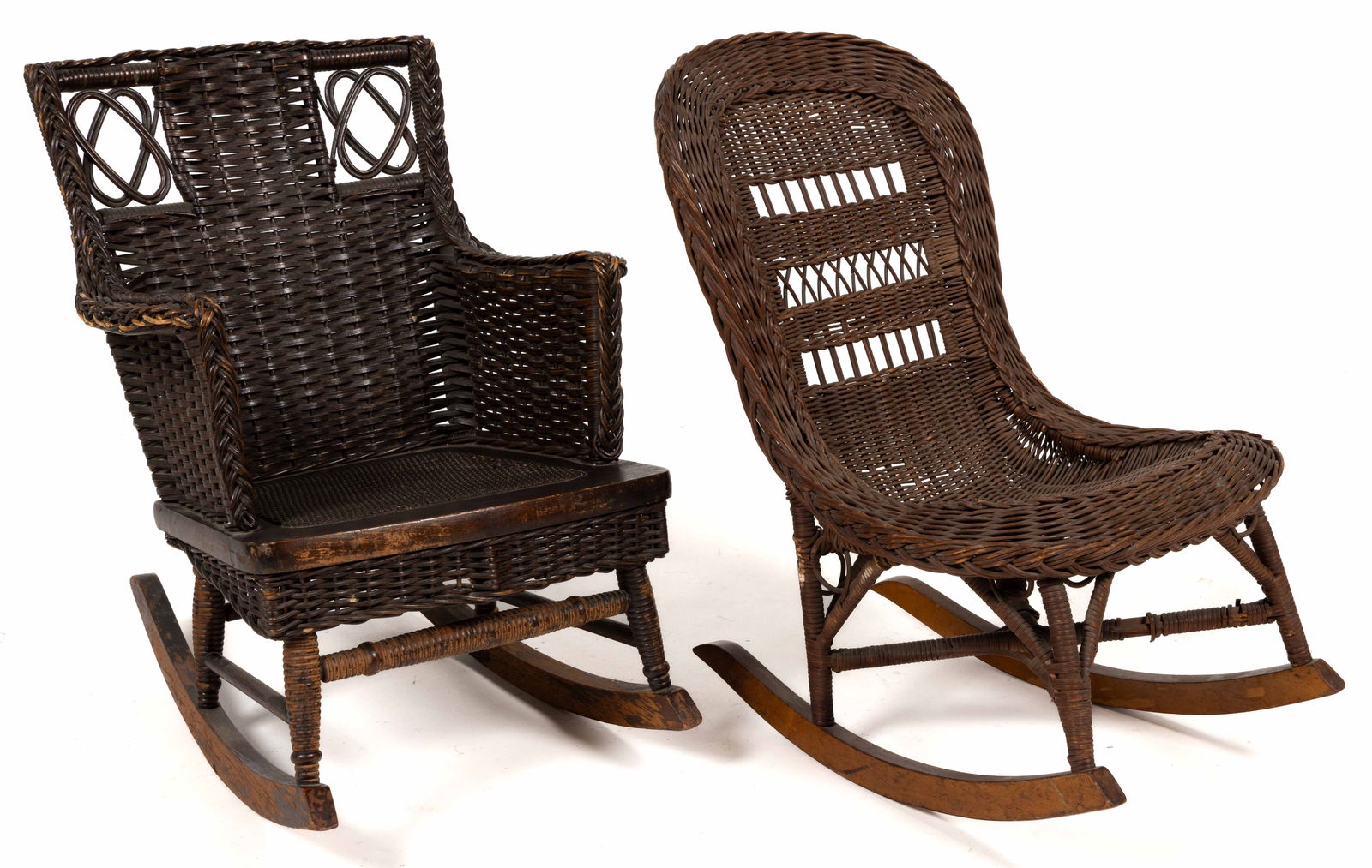 HEYWOOD BROTHERS AND WAKEFIELD CO. AND OTHER CHILDREN'S ROCKERS, LOT OF TWO: HEYWOOD BROTHERS AND WAKEFIELD CO. AND OTHER CHILDREN'S ROCKERS, LOT OF TWO, each of similar form with woven wicker over a wooden armature. The square-back example retains its label for Heywood Br
