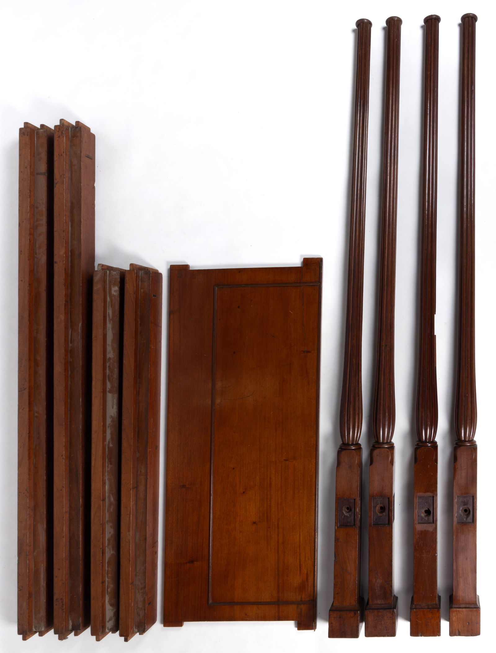 ENGLISH GEORGE III MAHOGANY FOUR POSTER BED / BEDSTEAD: ENGLISH GEORGE III MAHOGANY FOUR POSTER BED / BEDSTEAD, featuring turned reeded baluster-form posts on block feet connected by original rails, the headboard features an applied rectangular molded pane