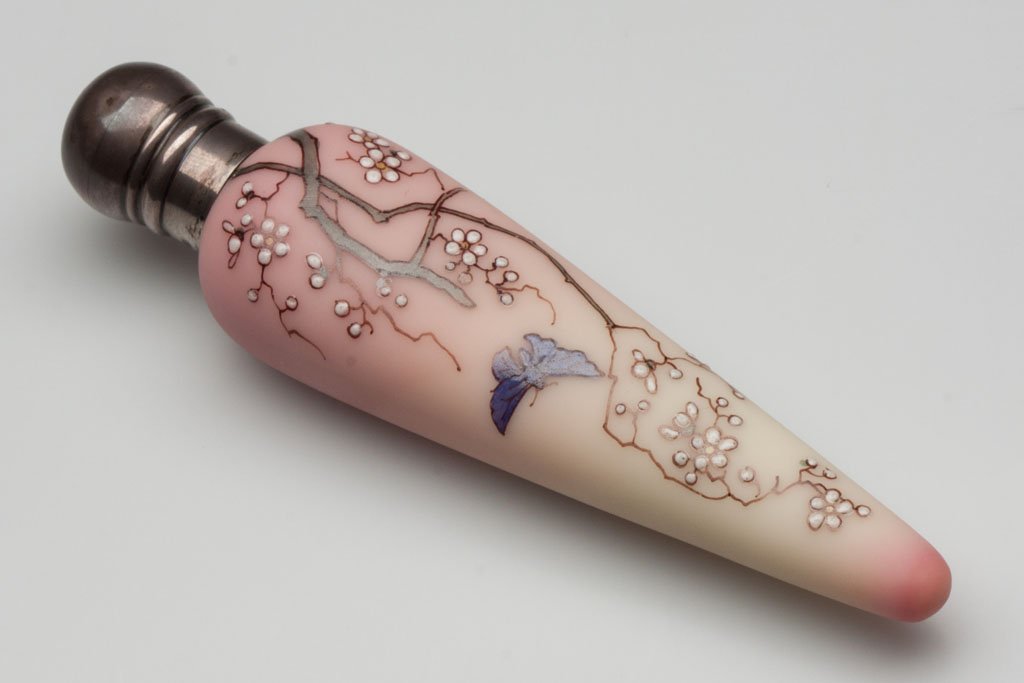 WEBB DECORATED BURMESE TAPERED SCENT BOTTLE: WEBB DECORATED BURMESE TAPERED SCENT BOTTLE, plush finish, delicate butterfly and floral decoration, two-part silver screw cap hallmarked for Birmingham. Thomas Webb and Sons, England. Fourth quarter