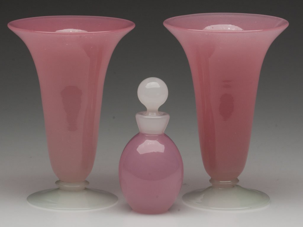 STEUBEN-TYPE ARTICLES, LOT OF THREE: STEUBEN-TYPE ARTICLES, LOT OF THREE, Rosaline and Alabaster, comprising a pair of trumpet vases, each with a rough pontil mark, and an ovoid cologne or perfume bottle with original stopper and polishe