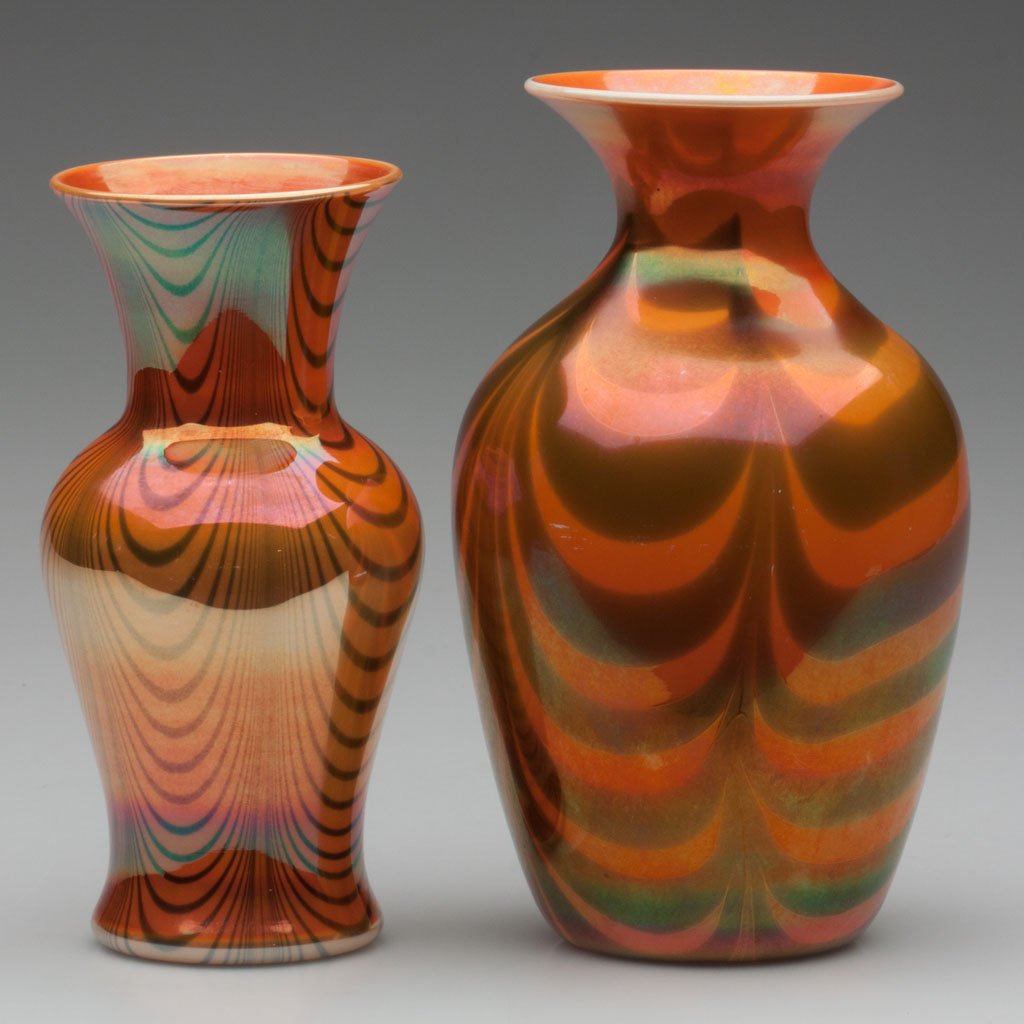 IMPERIAL DECORATED LEAD LUSTRE VASES, LOT OF TWO: IMPERIAL DECORATED LEAD LUSTRE VASES, LOT OF TWO, each glossy orange with blue drapes and orange interior, shapes 618 and 655, polished pontil marks, one with remnants of paper label. Imperial Glass C