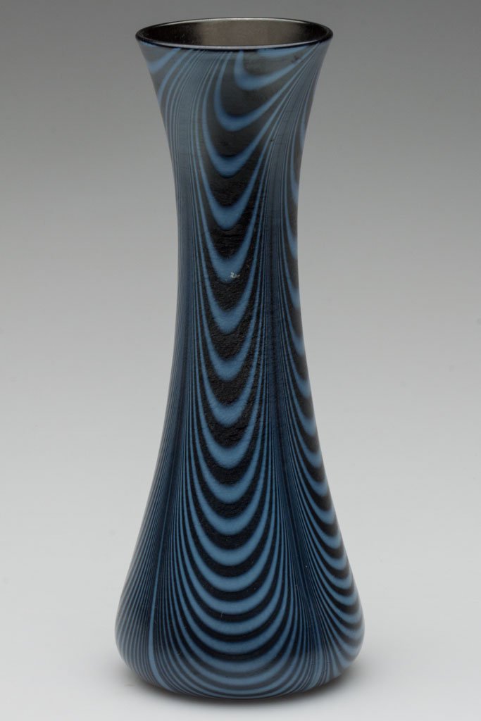 IMPERIAL DECORATED LEAD LUSTRE VASE: IMPERIAL DECORATED LEAD LUSTRE VASE, iridescent deep cobalt with delicate opal drapes, blue interior, shape 622, decoration 12, polished pontil mark. Imperial Glass Co. Circa 1925. 8 1/2" H. Literatur