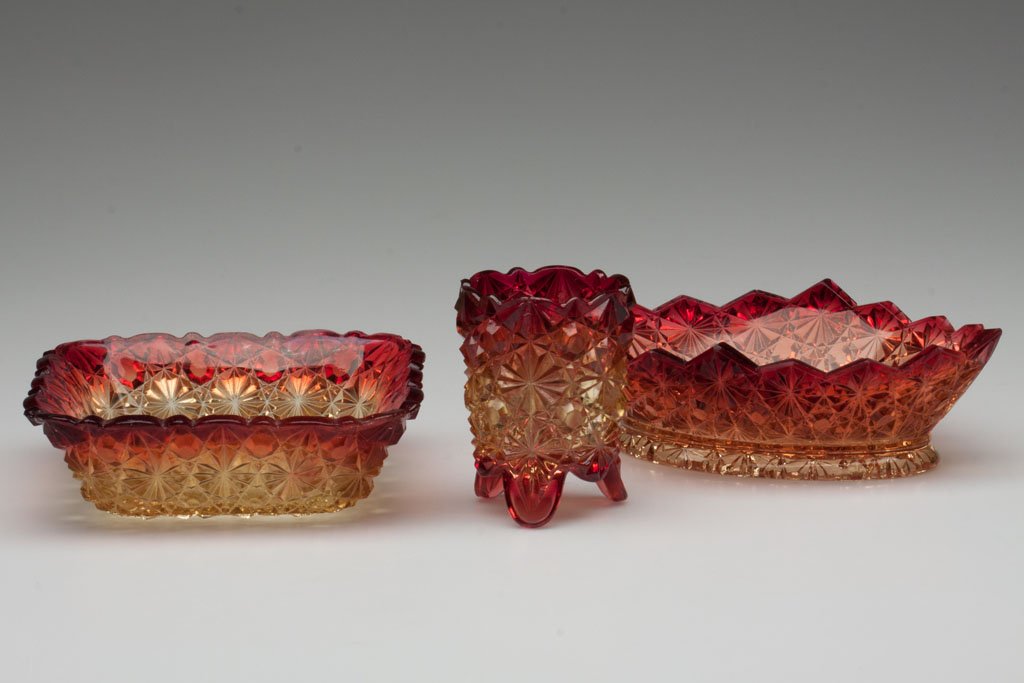 DAISY AND BUTTON ARTICLES, LOT OF THREE: DAISY AND BUTTON ARTICLES, LOT OF THREE, amberina, comprising a Hobbs No. 101 toothpick holder and square nappy, and a Gillinder diamond-shape dish. Hobbs, Brockunier & Co. Fourth quarter 19th century