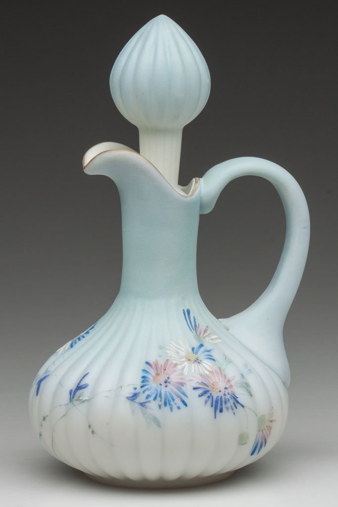 MT. WASHINGTON DECORATED OPAL RIBBED CRUET: MT. WASHINGTON DECORATED OPAL RIBBED CRUET, blue shaded to white with polychrome floral decoration, original stopper, ground pontil mark inscribed with "66" decoration number. Mt. Washington Glass Co.
