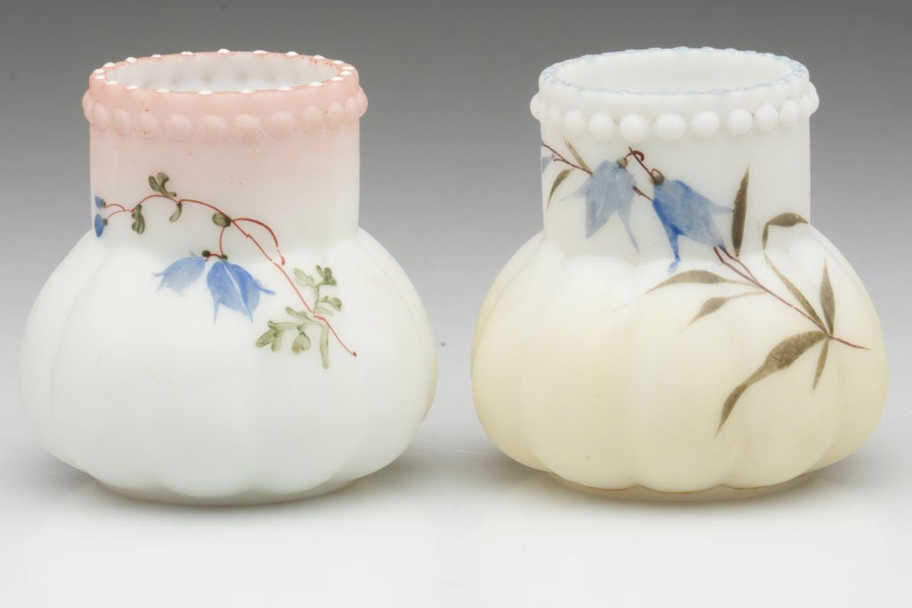 LITTLE LOBE TOOTHPICK HOLDERS, LOT OF TWO: LITTLE LOBE TOOTHPICK HOLDERS, LOT OF TWO, opal with various grounds and polychrome floral decoration, satin finish, one with blue enamel and other with white enamel dot decoration to rim, polished po