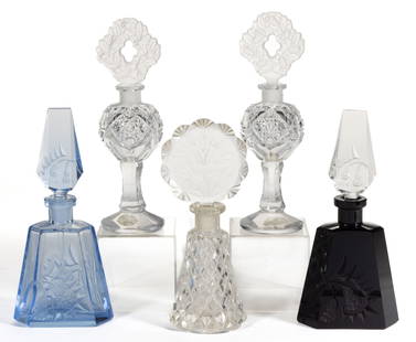 CZECHOSLOVAKIAN GLASS PERFUME BOTTLES, LOT OF FIVE: CZECHOSLOVAKIAN GLASS PERFUME BOTTLES, LOT OF FIVE, comprising a light blue and an opaque black with Art Deco intaglio flowers; a colorless cut diamonds with cut intaglio floral stopper; and a pair of
