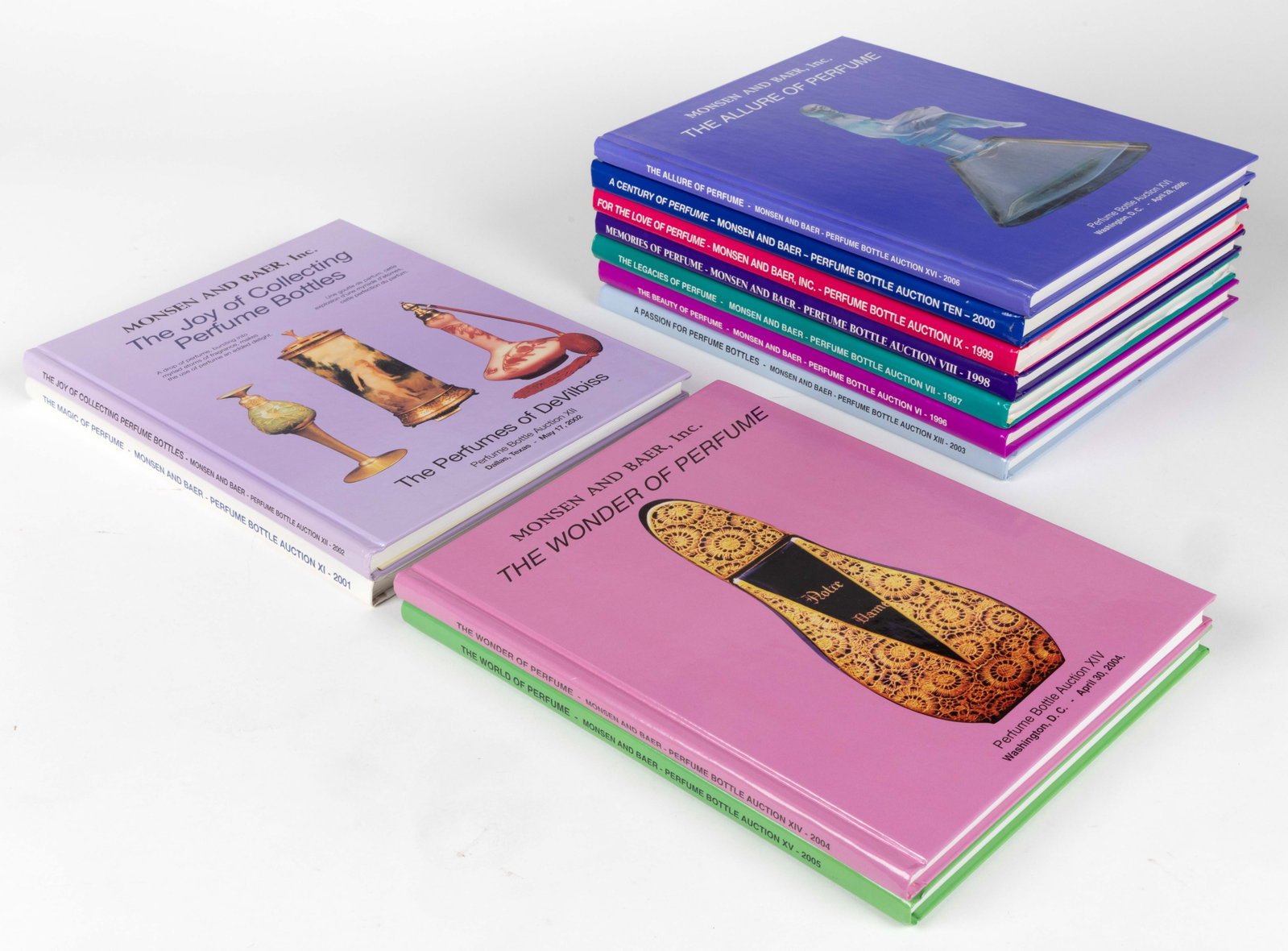 PERFUME BOTTLE AUCTION CATALOGUES, LOT OF 11: PERFUME BOTTLE AUCTION CATALOGUES, LOT OF 11, Monsen and Baer, Inc., 1996-2006, all but one with prices realized sheets. Hard covers. Provenance: From the estate collection of Tom Millman, Bethe