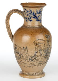 SIGNED HANNAH BARLOW (ENGLISH, 1871-1913), DOULTON LAMBETH DECORATED ANIMAL MOTIF STONEWARE JUG: SIGNED HANNAH BARLOW (ENGLISH, 1851-1913), DOULTON LAMBETH DECORATED ANIMAL MOTIF STONEWARE JUG, salt-glazed with cobalt accents, featuring incised images of goats, a chicken, and chicks, and floral d