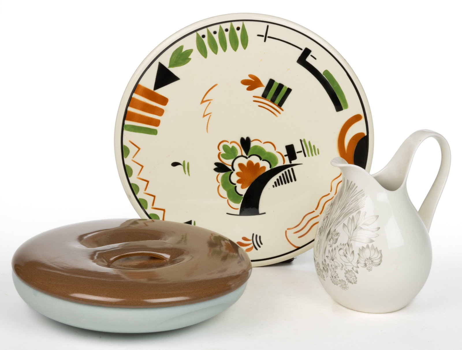 AMERICAN AND DUTCH CERAMIC ARTICLES, LOT OF THREE: AMERICAN AND DUTCH CERAMIC ARTICLES, LOT OF THREE, comprising an Eva Zeisel designed pitcher having whimsical transfer featuring birds amongst plants, a Russel Wright covered serving dish with divided