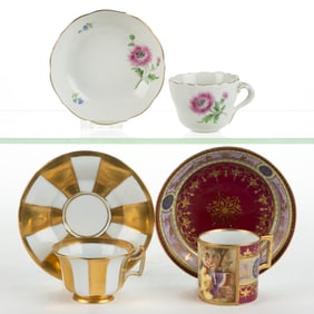 AUSTRIAN AND GERMAN PORCELAIN HAND-PAINTED DEMITASSE CUP AND SAUCER SETS, LOT OF THREE