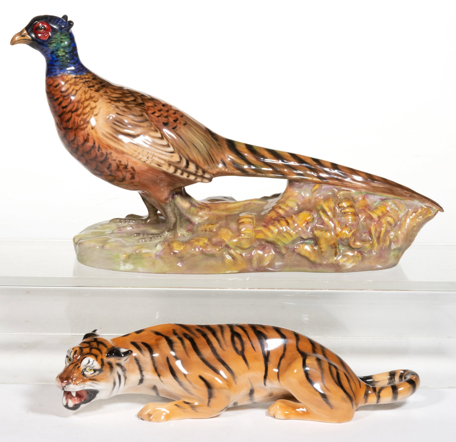 ENGLISH ROYAL DOULTON HAND-PAINTED PORCELAIN ANIMAL FIGURES, LOT OF TWO: ENGLISH ROYAL DOULTON HAND-PAINTED PORCELAIN ANIMAL FIGURES, LOT OF TWO, each having beautiful polychrome decorations, comprising a crouching tiger with mouth agape and ears laid back and a pheasant s