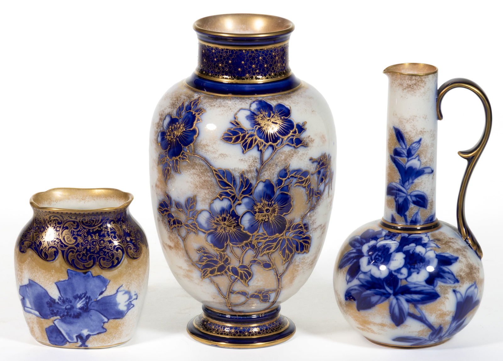 ENGLISH ROYAL DOULTON BLUE AND WHITE ART NOUVEAU FLORAL MOTIF CERAMIC ARTICLES, LOT OF THREE (1 of 3)