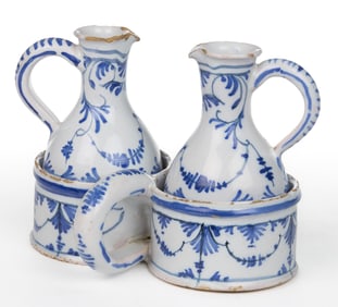 DUTCH DELFT TIN-GLAZED BLUE AND WHITE OIL AND VINEGAR THREE-PIECE CRUET SET