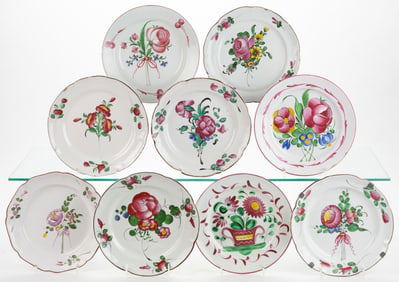 FRENCH FAIENCE TIN-GLAZED HAND-PAINTED FLORAL MOTIF EARTHENWARE PLATES, LOT OF NINE
