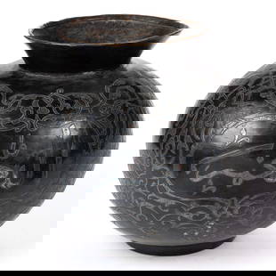 MIDDLE EASTERN ARABIC MIXED-METAL VASE / POT: MIDDLE EASTERN ARABIC MIXED-METAL VASE / POT, hammered brass with blackened finish, having spherical body with flared rim, overlaid / inlaid with silver-like metal featuring three vignettes of Arabic