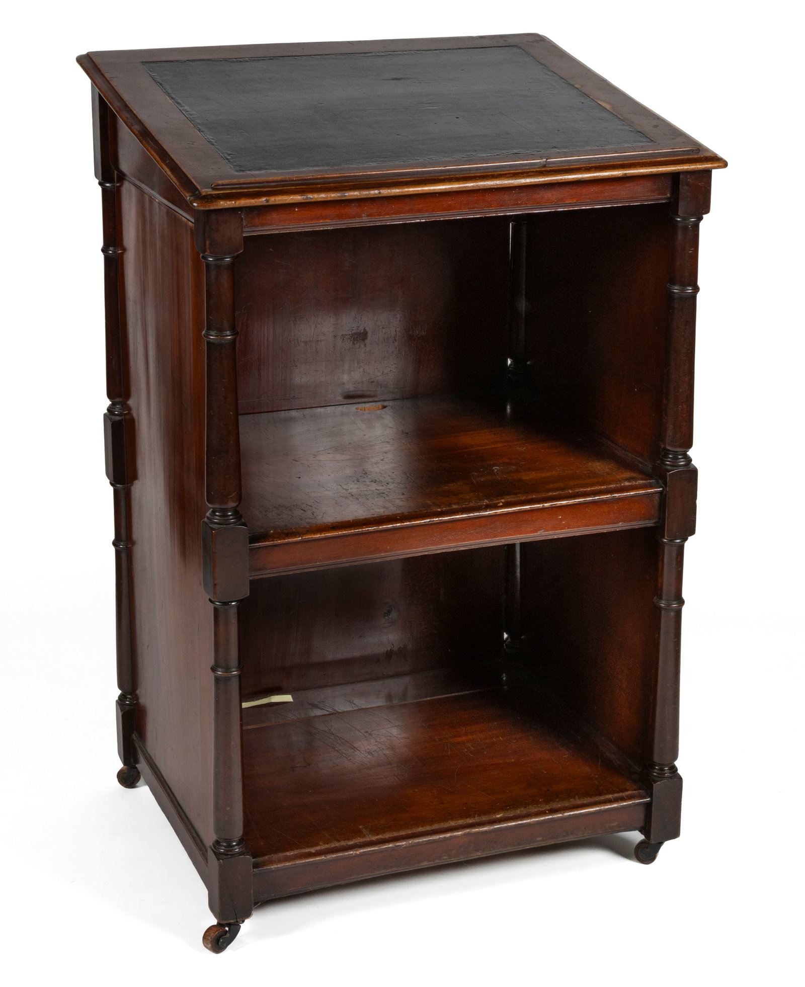 AMERICAN OR ENGLISH MAHOGANY LECTERN: AMERICAN OR ENGLISH MAHOGANY LECTERN, the sloped top with a molded edge, inlaid leather, and lower applied stop over a small single very bizarre folding side drawer with divided compartments, above tu