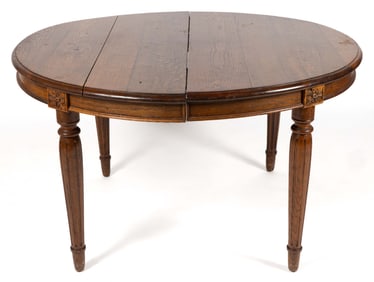 CONTINENTAL CARVED OAK DINING TABLE