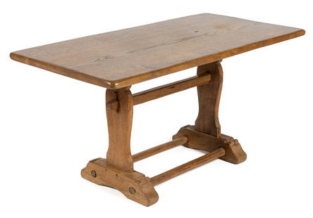 FRENCH OAK TRESTLE LOW / COFFEE TABLE: FRENCH OAK TRESTLE LOW / COFFEE TABLE, the rectangular top with rounded corners supported by a trestle-style base with two vasiform supports connected by a pinned stretcher and resting on two shaped f