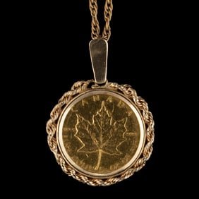 1985 CANADIAN MAPLE LEAF $10 1/4 OZ. .9999 FINE GOLD COIN IN 14K YELLOW GOLD PENDANT