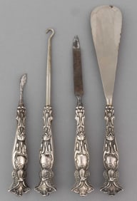 ART NOUVEAU STERLING SILVER-HANDLED FOUR-PIECE DRESSER / VANITY SET