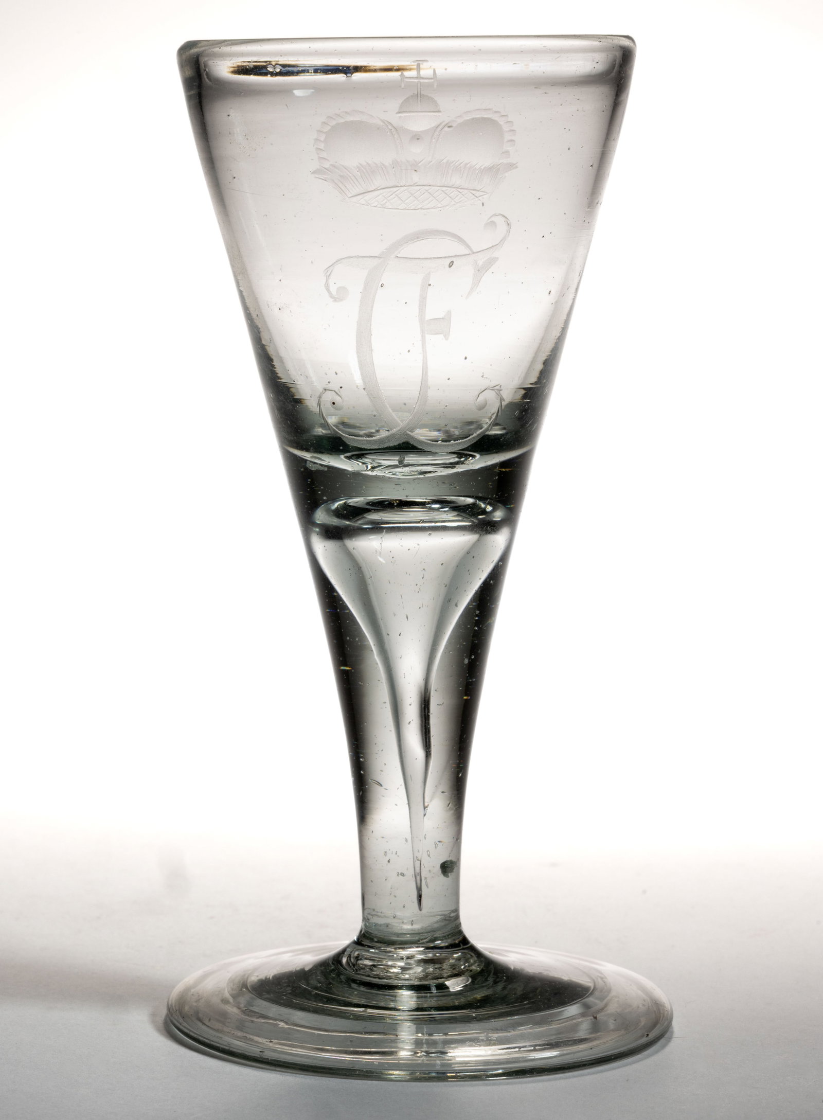 SCANDINAVIAN FREE-BLOWN AND ARMORIAL ENGRAVED ALE / WINE GLASS: SCANDINAVIAN FREE-BLOWN AND ARMORIAL ENGRAVED ALE / WINE GLASS, colorless non-lead glass with green-gray tint, funnel bowl with a finely engraved crown above a script "CF" or "FC" 