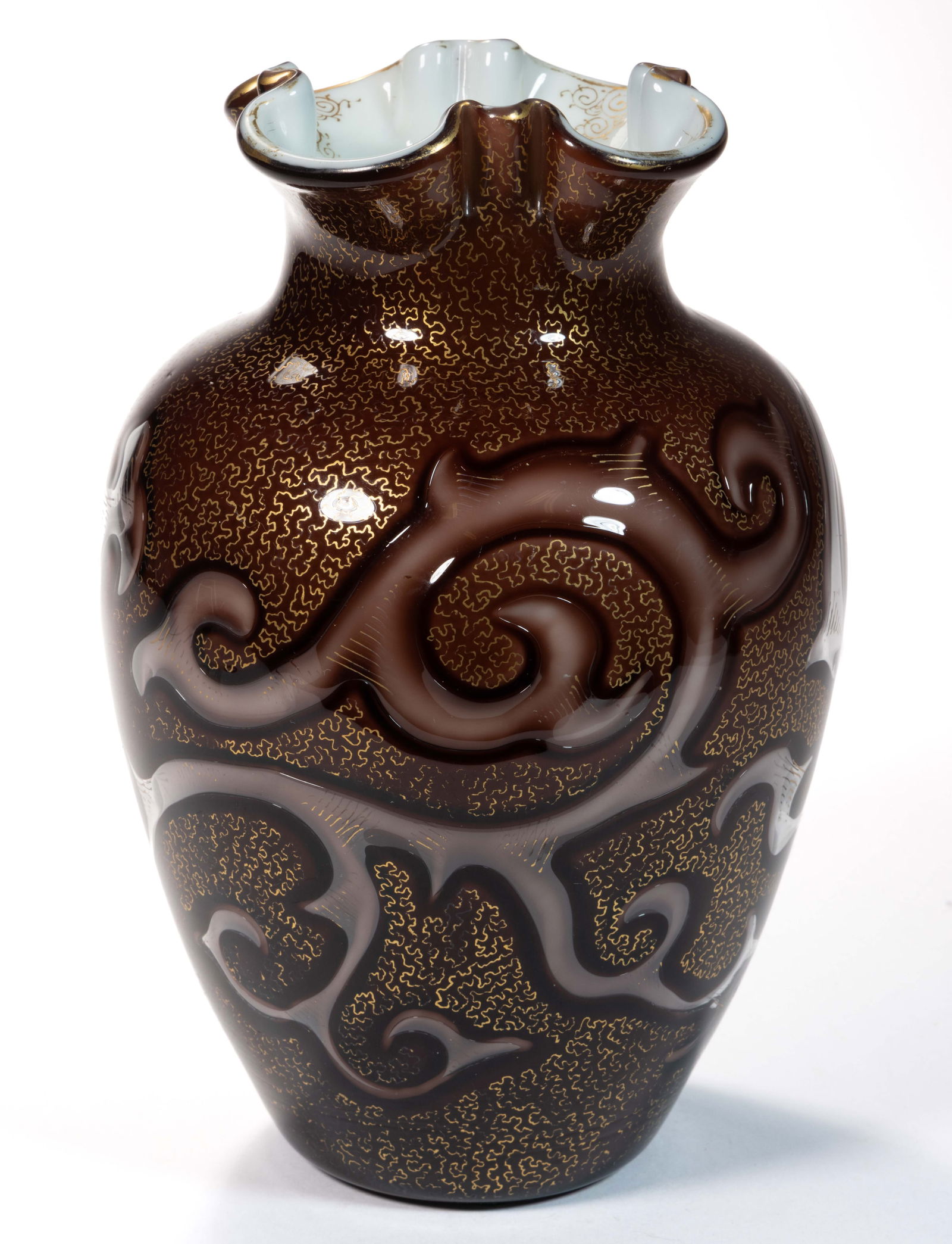 LOETZ ATTRIBUTED OCTOPUS ART GLASS VASE: LOETZ ATTRIBUTED OCTOPUS ART GLASS VASE, cased deep brown with opal interior with overall gilt decoration, urn form with a quatrefoil rim with gilt scrolling to the interior, finely done scrolling air